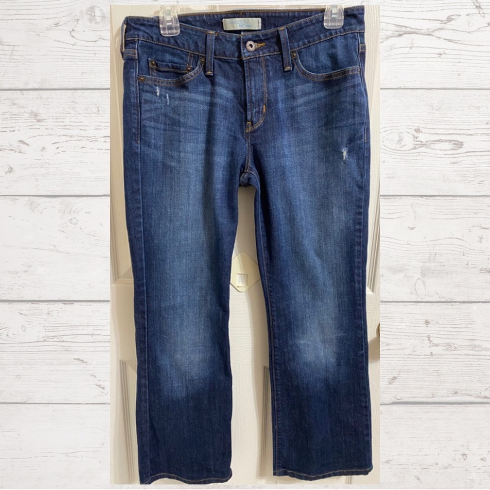Levis 545 rise low boot cut/size 10/back button pockets